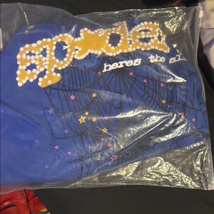 Blue Graphic Tee with Spider Web and Stars